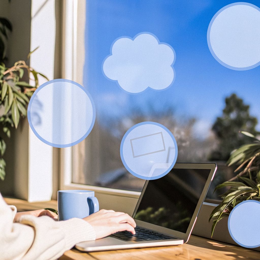 person at a laptop surrounded by thought bubbles and invisible tasks