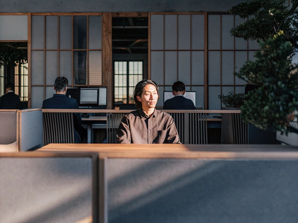 calm leader in busy office