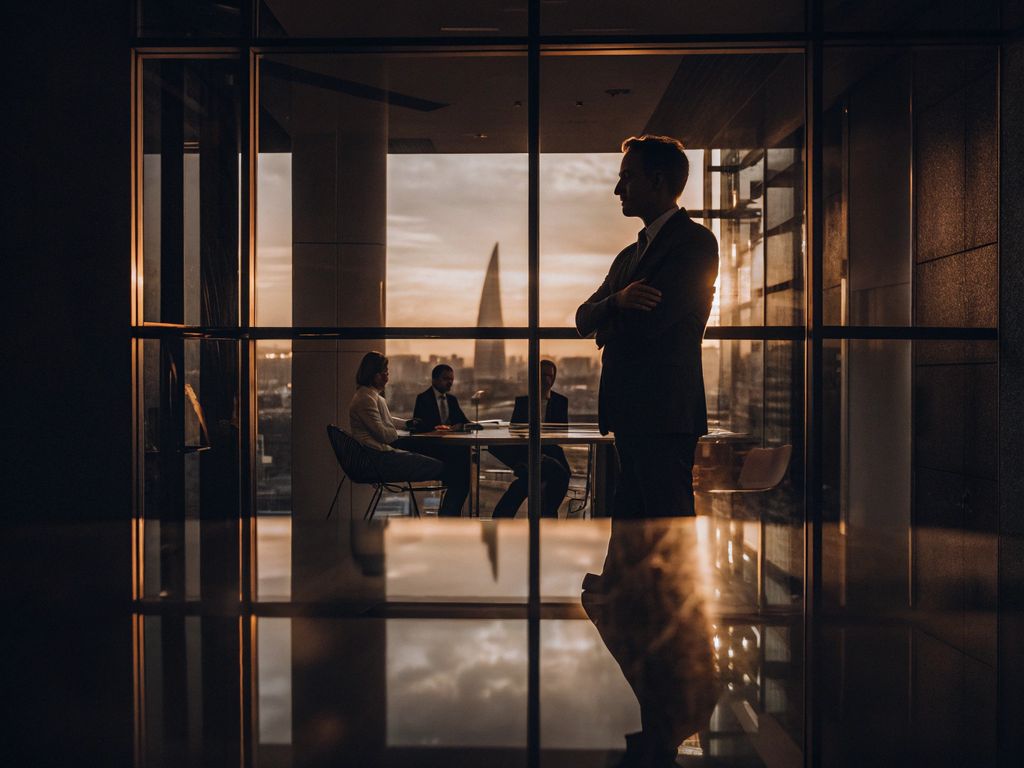 leader reflecting at sunrise