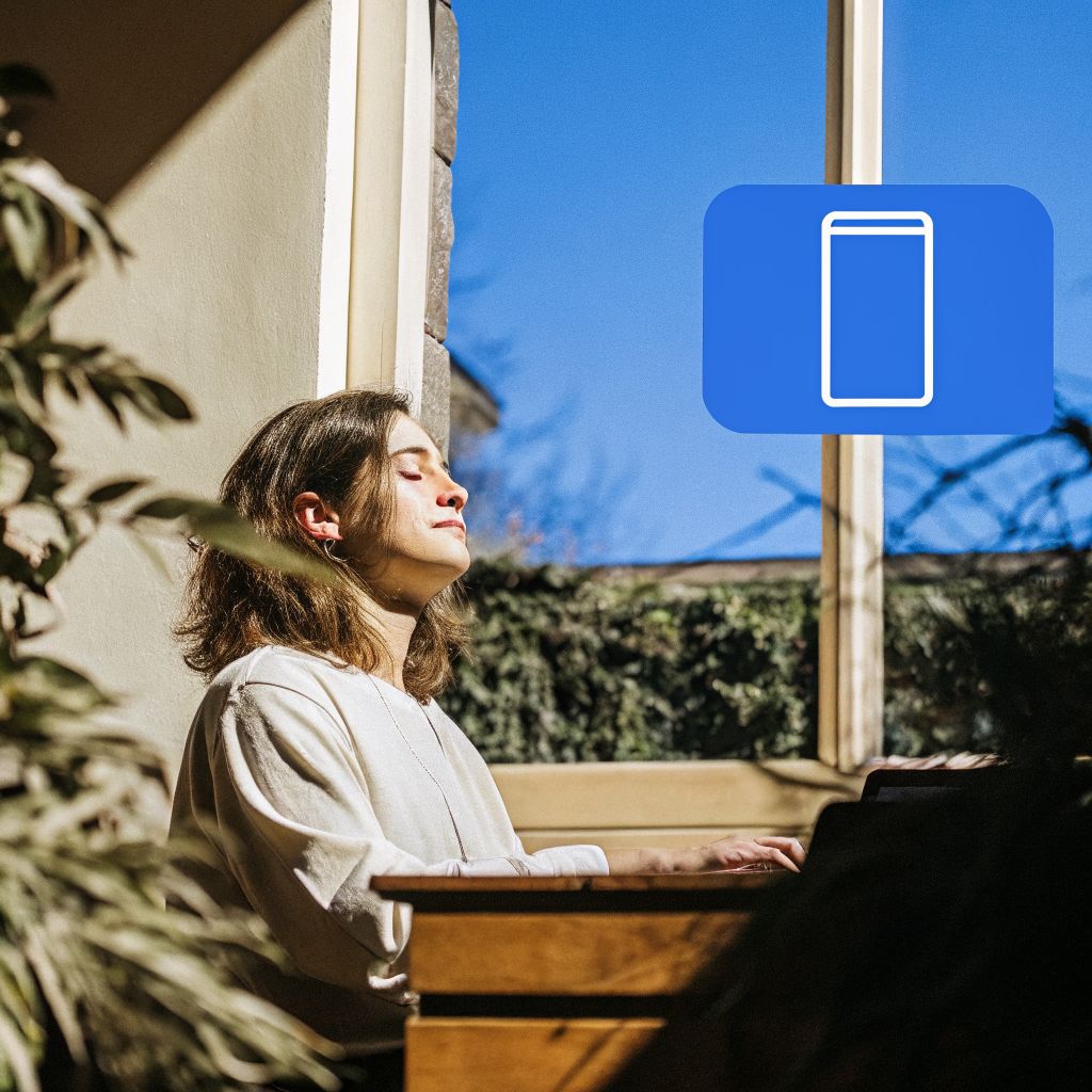 person at a desk with a half-drained battery overlay
