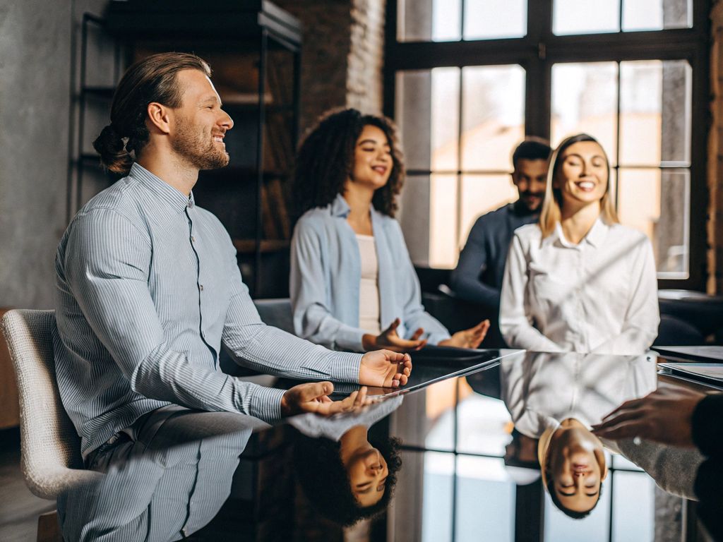 diverse team engaged in mindful conversation