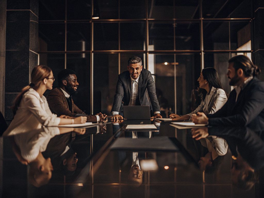 Diverse team in modern workspace, some energized, some subdued
