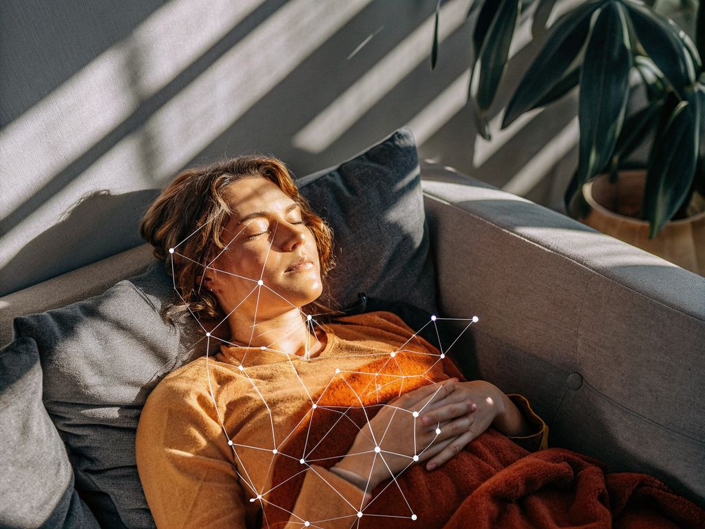 person quietly pausing in thought, subtle data overlay