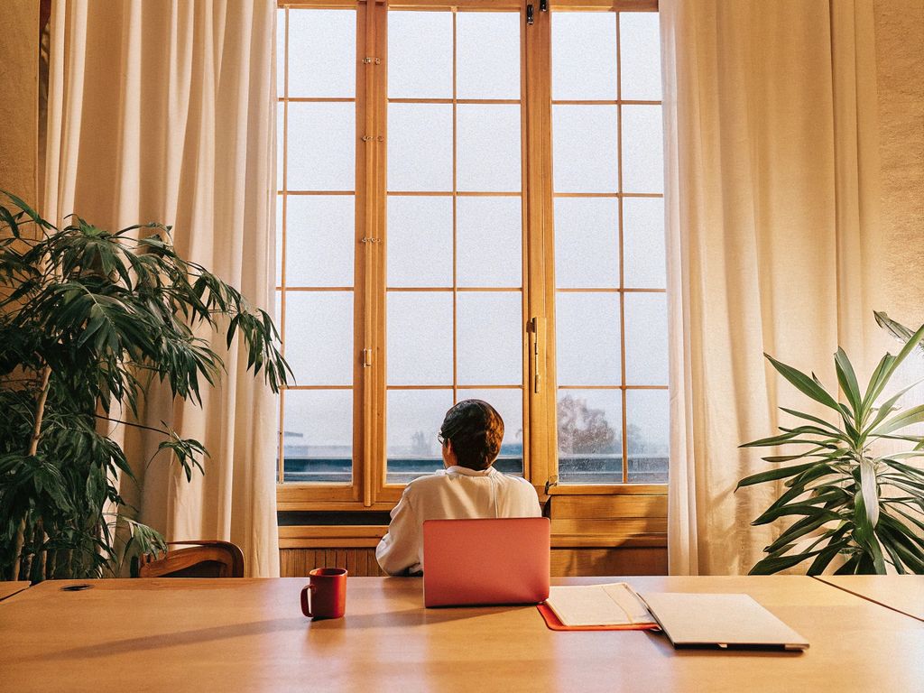 Leader alone in office at dusk