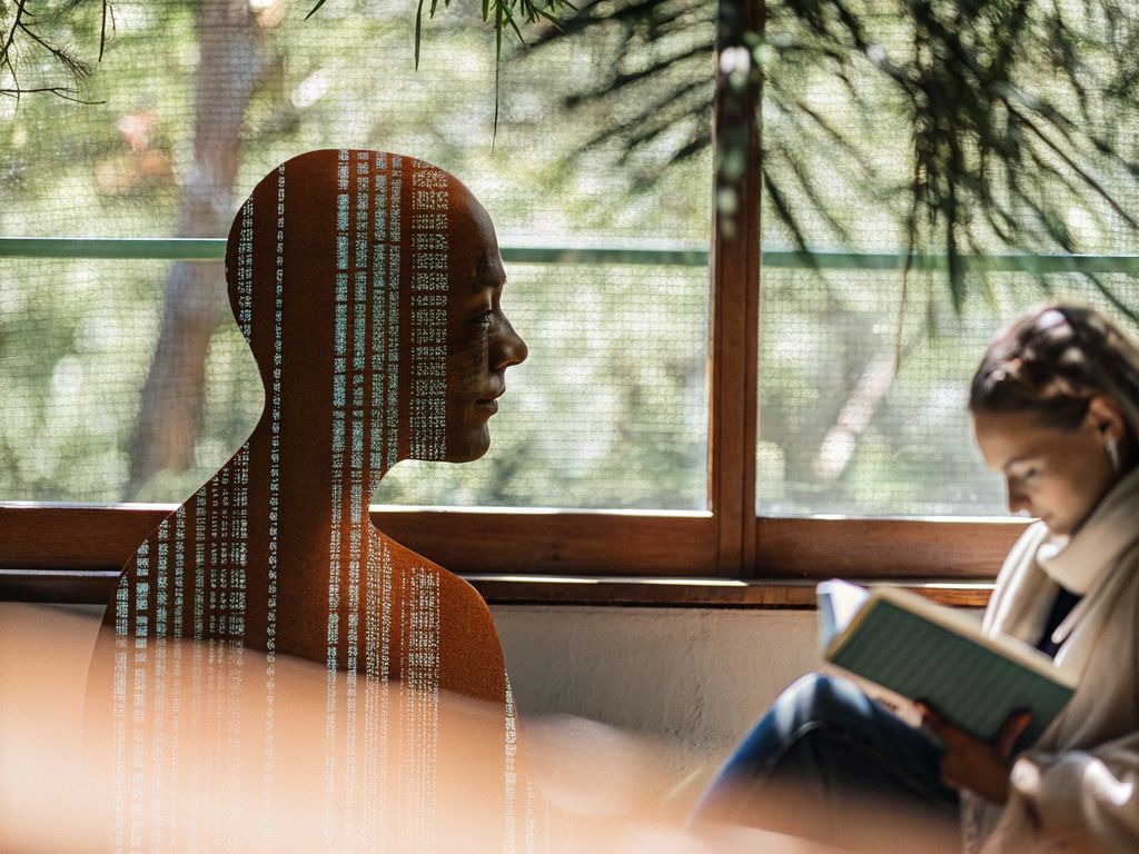 silhouette overlaid with code