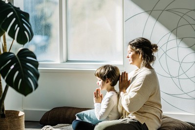 Parent and child using calming breath together