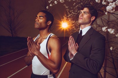 Sprinter and executive practicing breathing before event