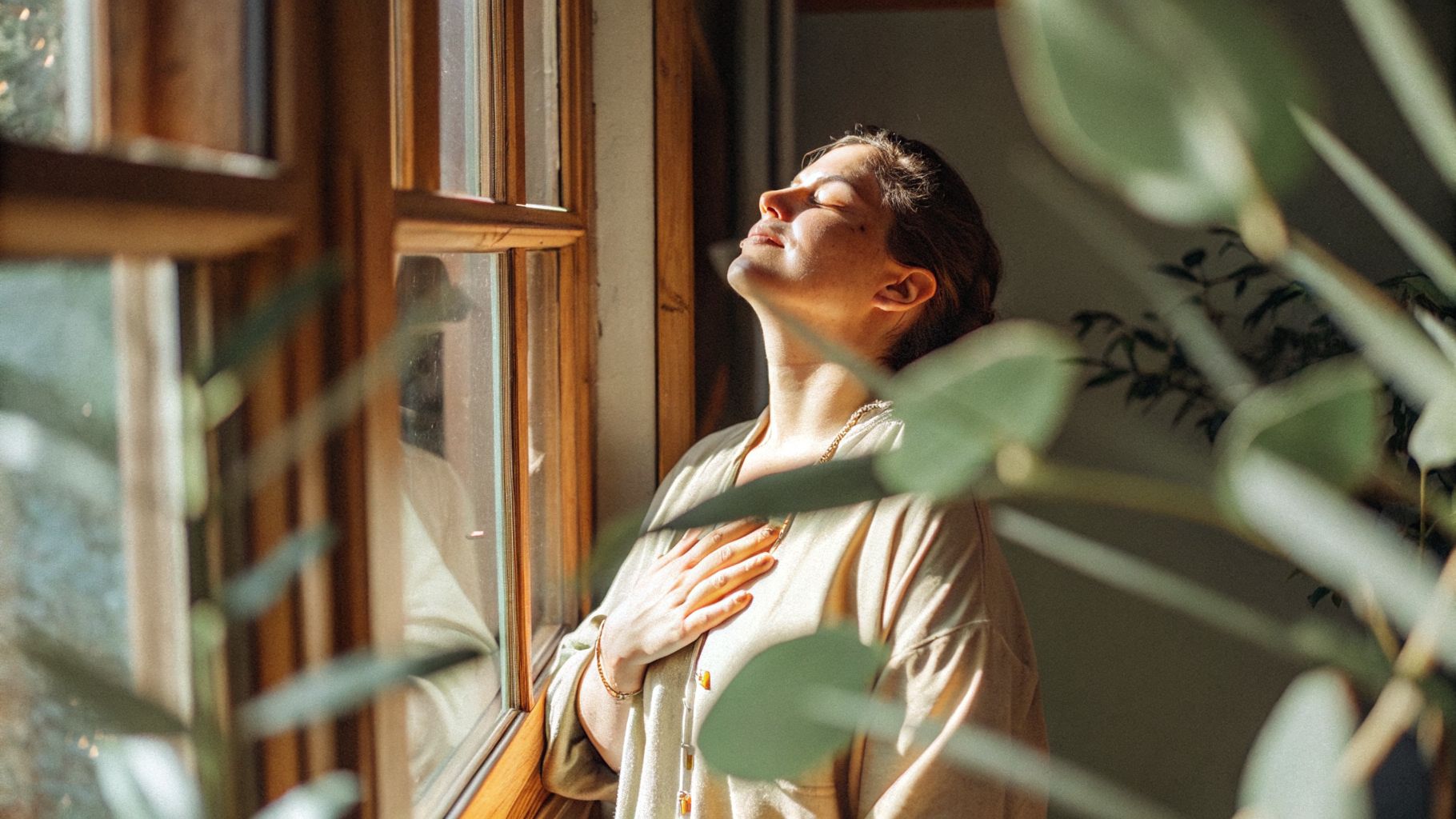 Awareness and change begin with a quiet pause by the window in soft morning light