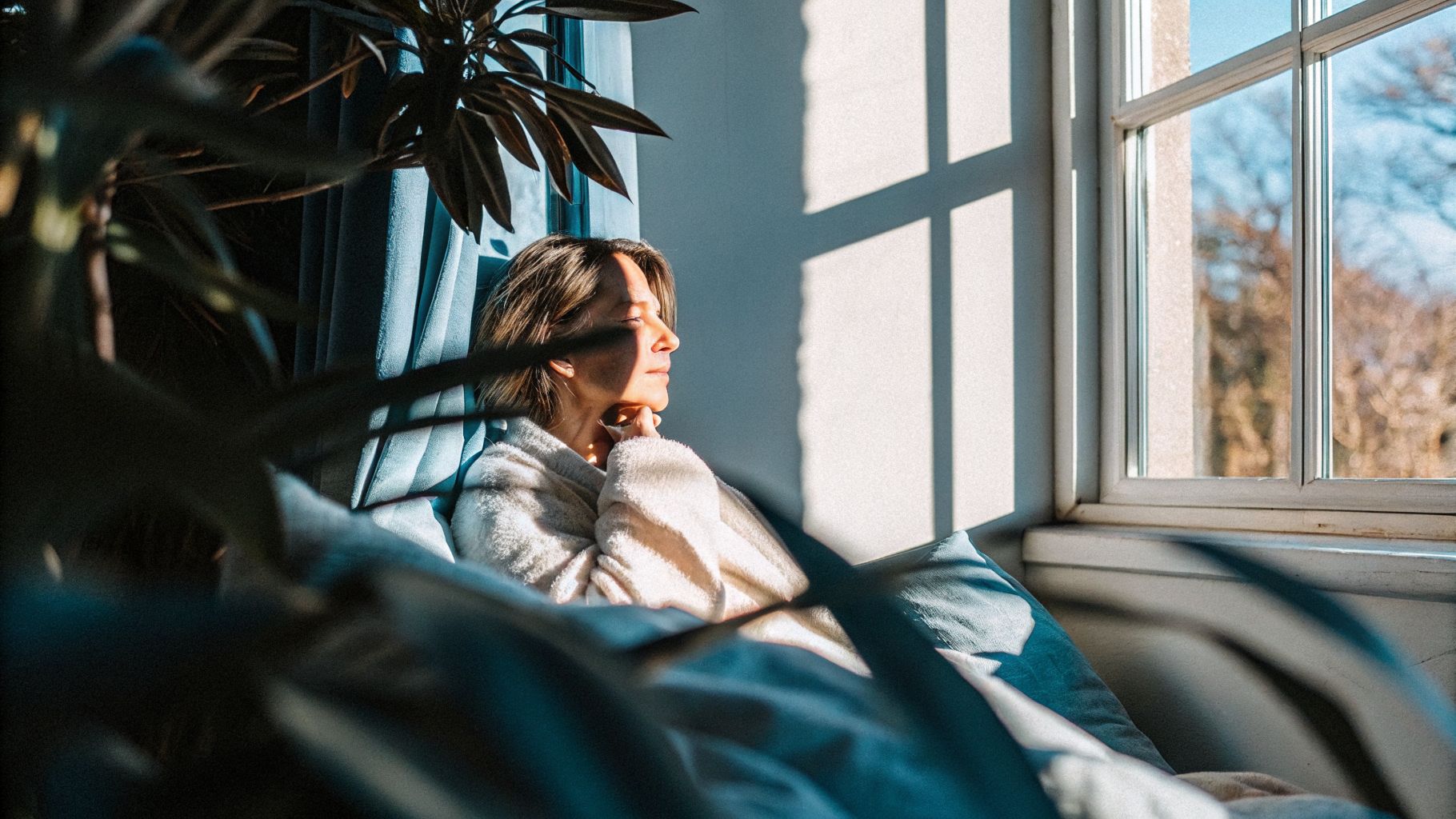 Attention as the switch—energy flows where attention goes as a person gazes out a window